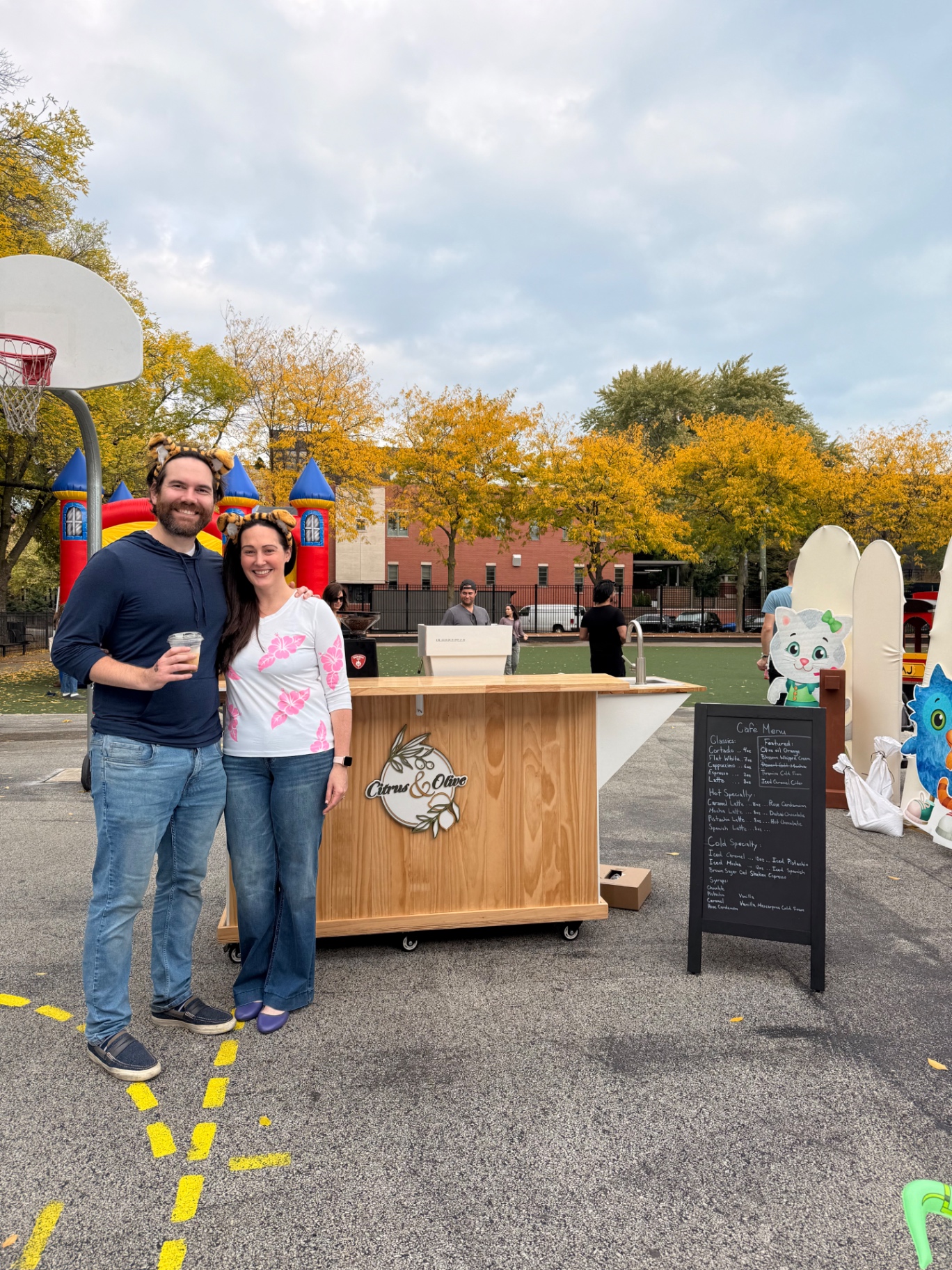 Guests posed with the Citrus & Olive cart at a Chicago private celebration