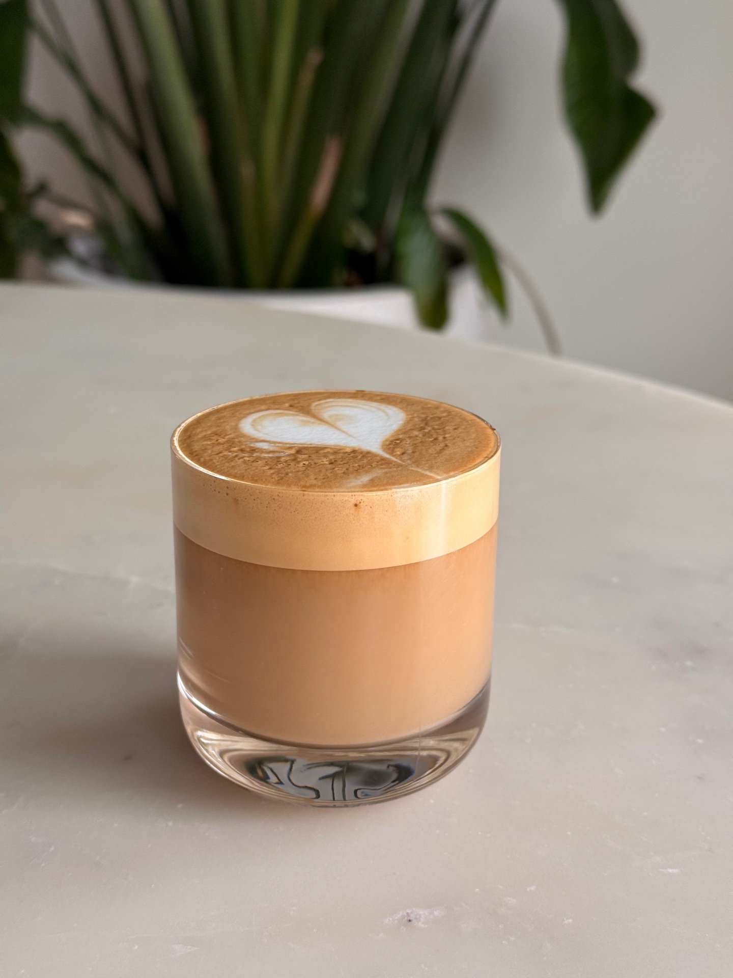 Citrus & Olive signature latte in glass